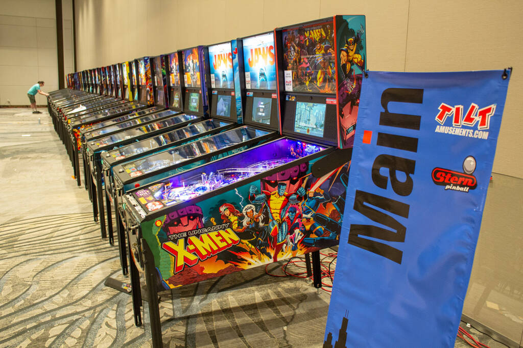 The machines for the main tournament are on the right side of the room