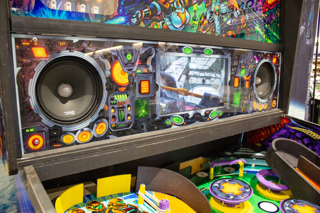 It features an LCD panel, a backbox bagatelle feature and a lower playfield