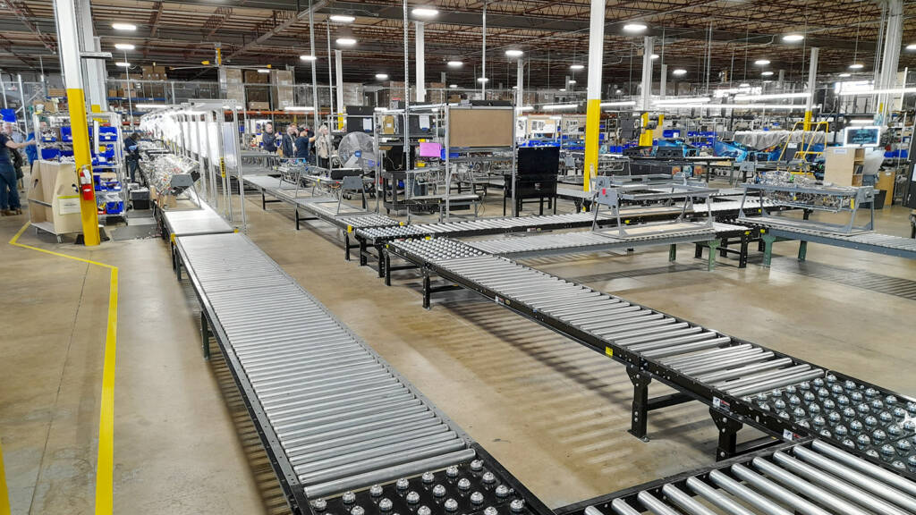 The factory has one long production line for the main title and one shorter one for lower runs