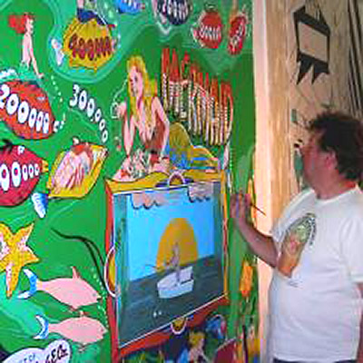 Artist Dan Fontes puts the finishing touches on his Gottlieb Mermaid. PPM Archives
