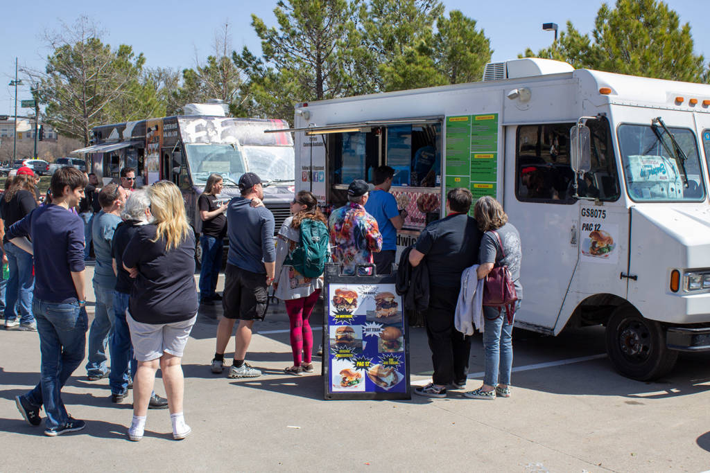 Two of the food trucks offering Korean noodle bowls and burgers