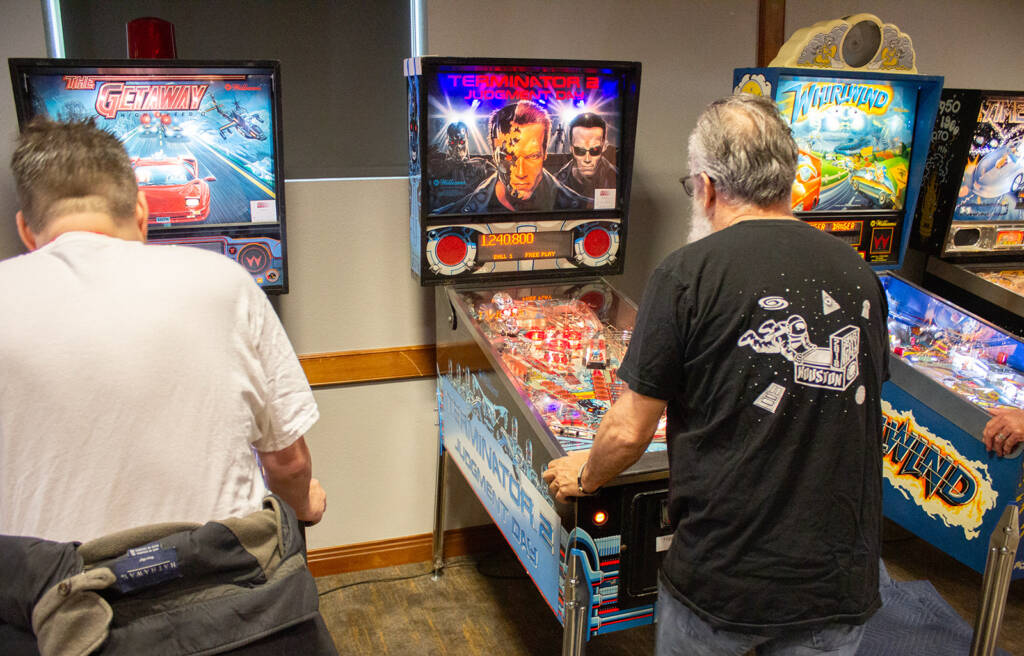 Players on the classic machines in the Wizards Tournament