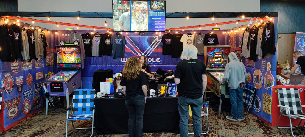 Wormhole Pinball had a stand in the corridor selling merchandise and  also ran tournaments