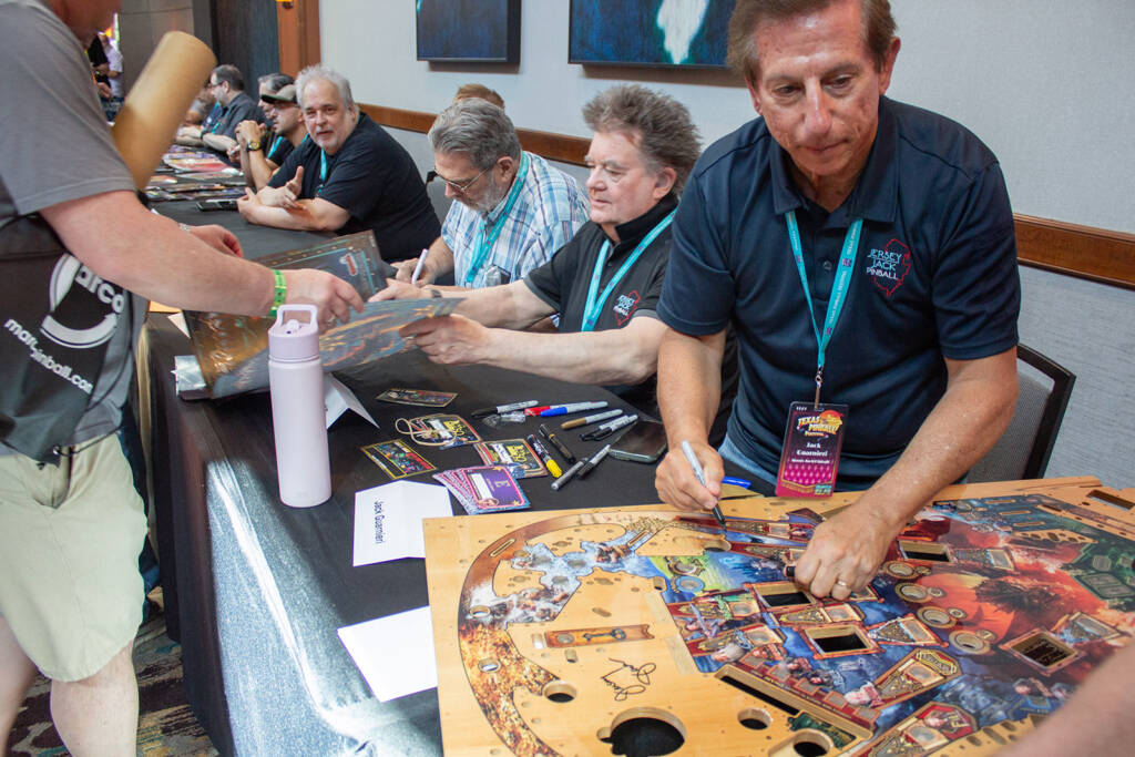 Jack signing a The Hobbit playfield