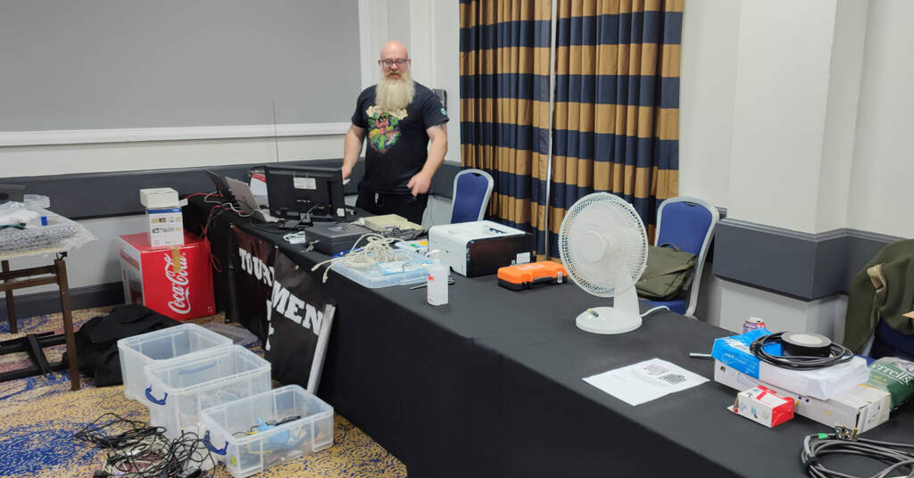 Shaun Harvey sets up the Classics room ready for Saturday's qualifying rounds