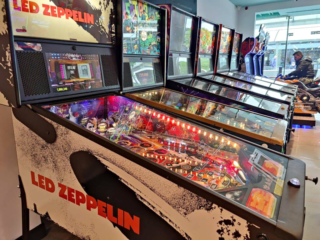 Six of the seven pinballs at Funland Arcade, since joined by Godzilla