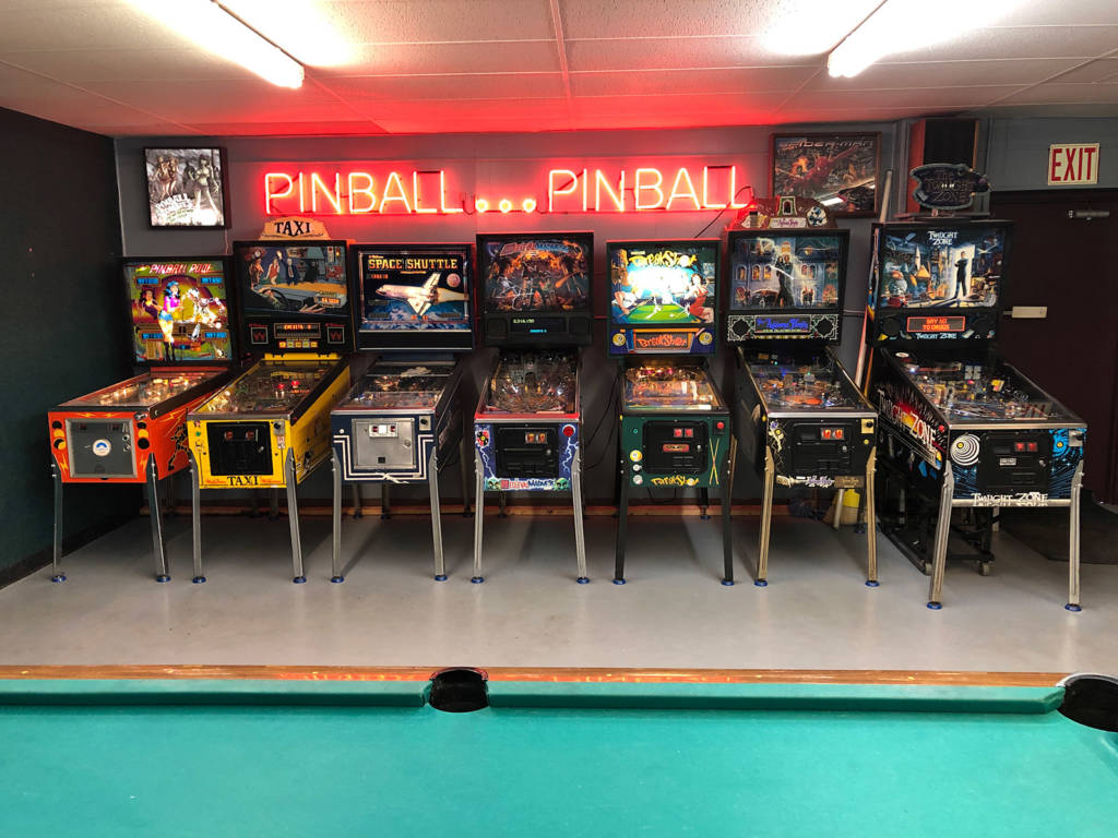 Let's go in for a closer look and really appreciate the variety of pinball machines, and pricing, Lloyd has