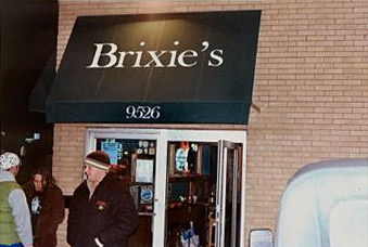 Look for the green "Brixie's" awning