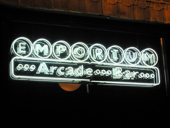 A welcoming neon sign in the front window