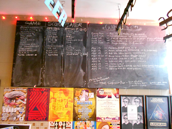 Top scores are recorded on a board