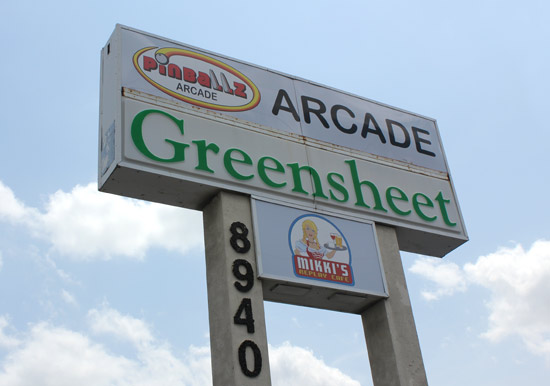 The sign for the arcade, visible from the 183
