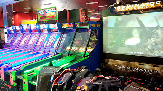 Skee-balls alongside collaborative shooter games