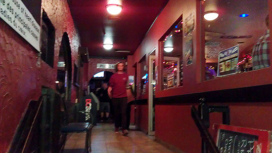 The main bar is ahead, pinball on the right
