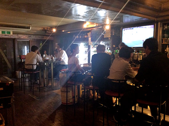 The bar is busy with many guests